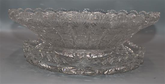 A heavy cut glass bowl and a dish